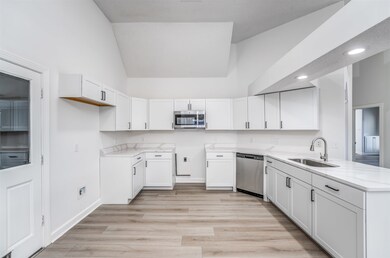 Kitchen featuring sink, stainless steel appliances