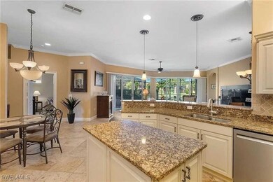 Kitchen featuring crown molding, backsplash, a sin