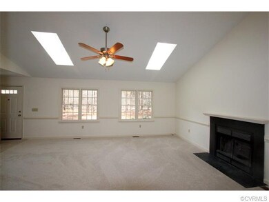 The open, spacious Living Room with a vaulted ceil