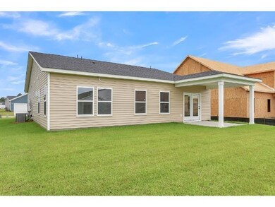 Back of property with a patio, central air conditi