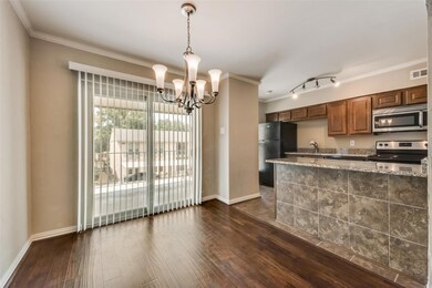 Open concept dining with new sliding glass doors a