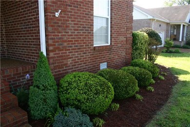 Well cared for landscaping in the front of the home