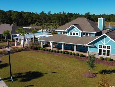 View of front of house with a front yard, a pergola, a chimney, and a shingled roof