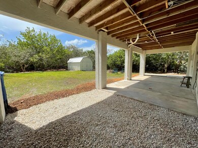 Covered Patio faces back yard