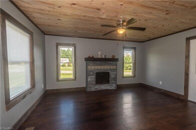 Large living Room with Fireplace, custom mantle, outlets over the mantle ready for TV!