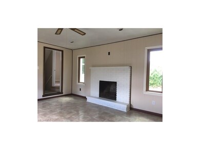 Family Room with Woodburning FP, new flooring and 
