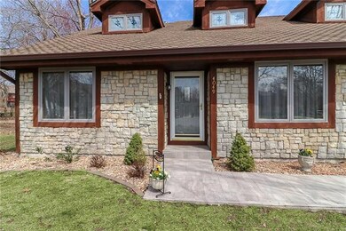 BEAUTIFUL REDWOOD TRIM AND STONE VENEER