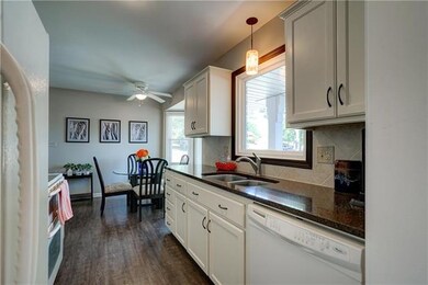 Nicely remodeled kitchen with quartz counter tops.