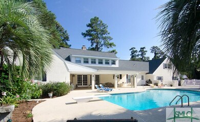 Relax under the covered patio or dive right in to 