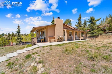 Tucked away home and custom barn/garage with easy access.