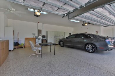 EPOXY GARAGE FLOOR, STORAGE CABINETS, HURRICANE EX