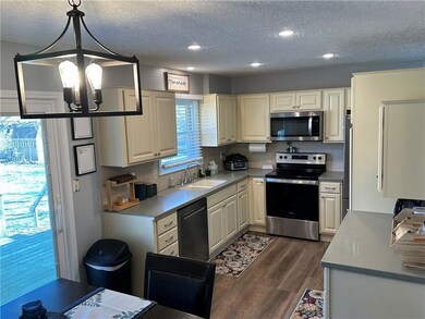 519 S Washington St, Raymore, MO 64083 - photo 2