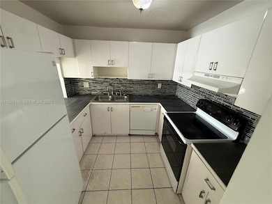 1900 W 68th St unit G308, Hialeah, FL 33014 - photo 2