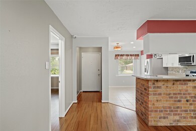 Photo showcases a welcoming entryway leading to a