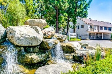 Waterfall to the left of the entrance.