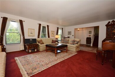 Formal Living Room with lots of natural light.