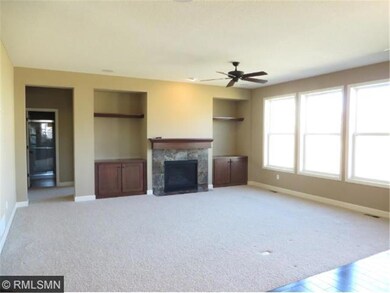 The family room features a gas fireplace, built-in