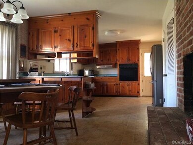 Large kitchen with family sized breakfast area, in