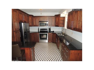 View of the full kitchen note the solid surface co