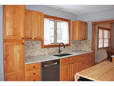 Beautiful updated kitchen with onyx back splash, q