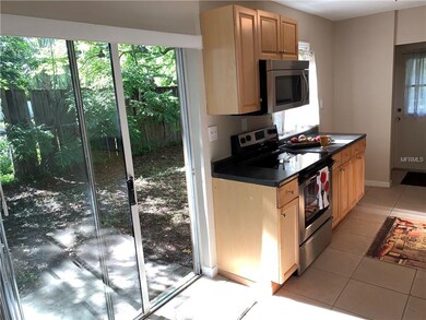 Easy access to side patio for outdoor grilling and