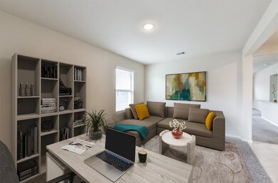 Virtually Staged - home office. The home office is located just off of the entry.