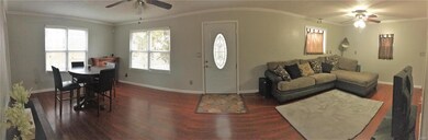 Another view of large living room and dining area