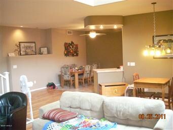 LOOKING BACK TO KITCHEN EATING AREA