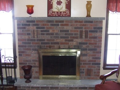 Brick Fireplace in Living Room
