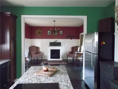 Kitchen adjacent to the den and living room great 