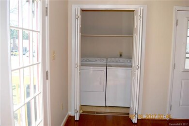 Laundry room is just off the dining room area.