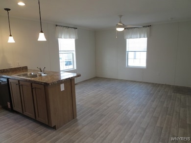 Open floor plan & all windows are double hung  which makes for easy cleaning inside!  Neutral flooring throughout...