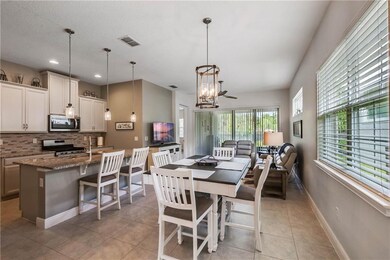 Open floor plan with tile through the whole living