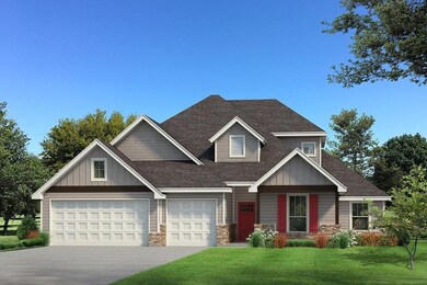 Craftsman inspired home with a garage and a front 