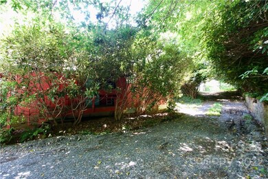 Entry Tucked Behind Native Rhodos