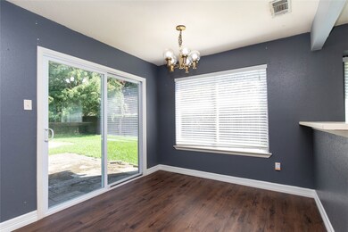Breakfast room with sliding glass door to the pati