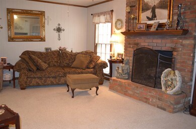 Large den with fireplace.