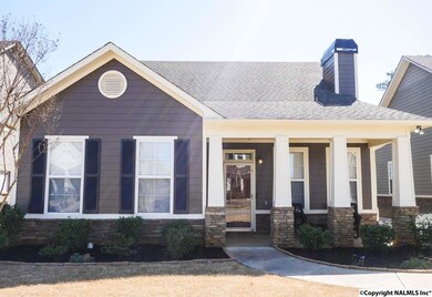 Front column detail and attractive stone accents create nice street appeal.