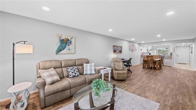 Living room featuring recessed lighting, baseboard
