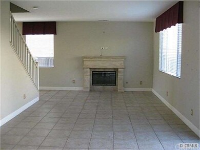 Very large open family room with fireplace.