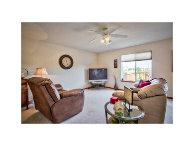 Living Room. NEUTRAL FLOORING AND LIGHTING