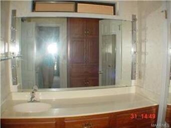 Master bath includes split vanities, good storage,