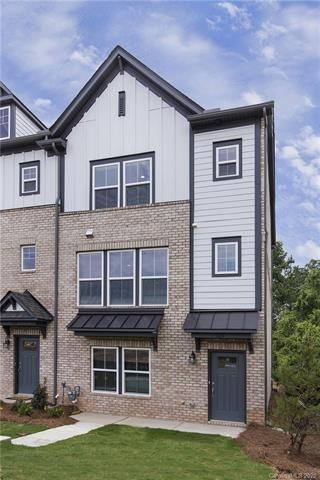 Charming entrance with partial brick and James Har