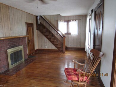 Original hardwood floors and trim add beauty and c