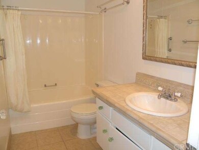 Super clean bathroom has newer tile counters, new 
