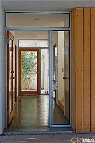 Two entrances to the home; one from the carport, t