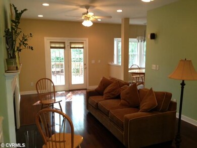 Living Room - View two of Living Room and doors to