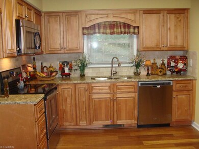 Kitchen - Granite Countertops, New Cabinets, Stainless Appliances, Hardwood Floors