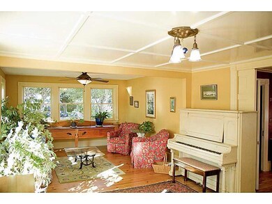Living Room. A pocket door separates...