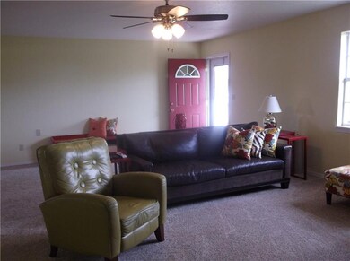 NICE SIZE LIVING AREA. OPEN TO DINING AREA AND KIT